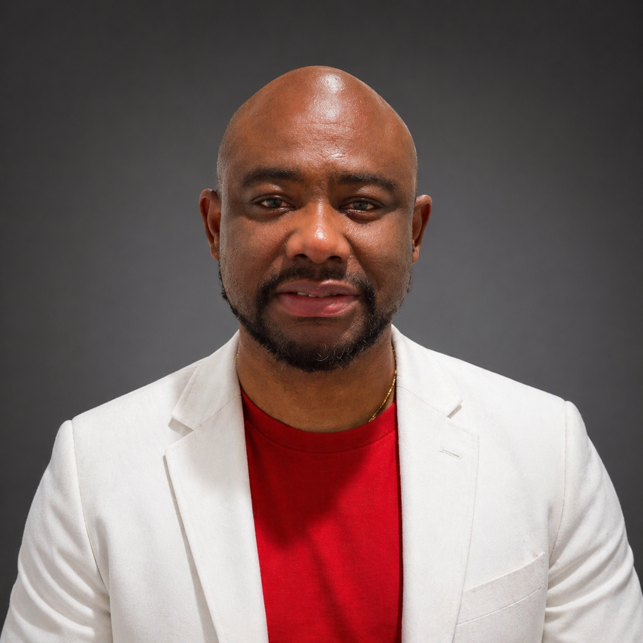 Micheal O. Afolabi wearing a white blazer